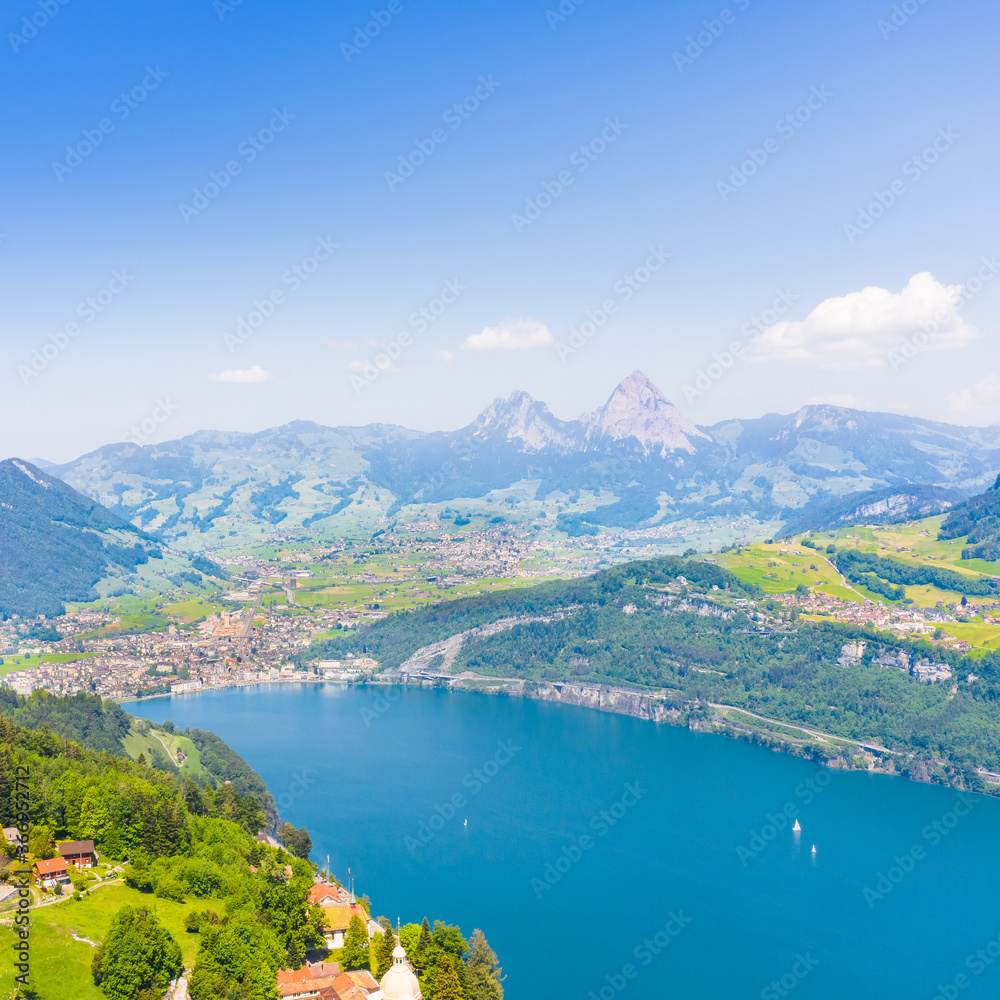 Panoramic aerial view of the canton Schwyz in central Switzerland. Mountain peaks Great Mythen 1898 m and Small Mythen 1811 m Panoramic aerial view of the canton Schwyz in central Switzerland. Mountain peaks Great Mythen 1898 m and Small Mythen 1811 m