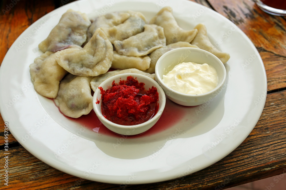 dumplings with blueberries with cream and strawberry mousse dumplings with blueberries with cream and strawberry mousse