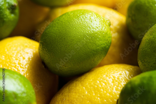 Photography close up view of fresh ripe lemons and limes