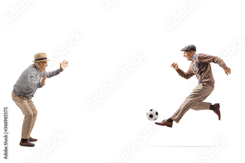 Two grandfathers playing soccer