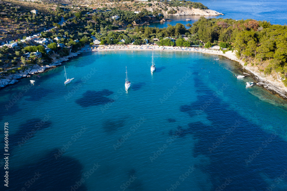 Obraz premium Sail boats in turquoise water in Thassos, Greece