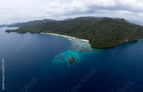 Drone view of a paradise beach in Raja Ampat, Papua, Indonesia