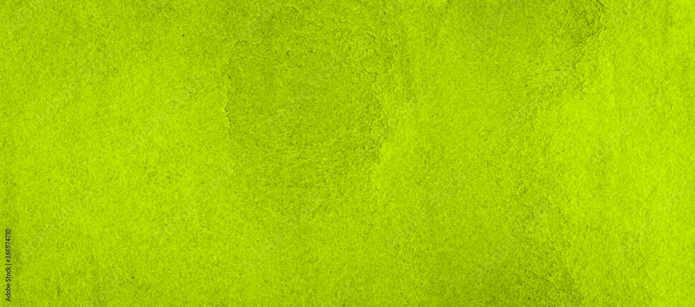 Vibrant green watercolor background with ragged strokes and uneven blurred paint. Abstract lime background for designs, layouts and patterns. Vibrant green watercolor background with ragged strokes and uneven blurred paint. Abstract lime background for designs, layouts and patterns.