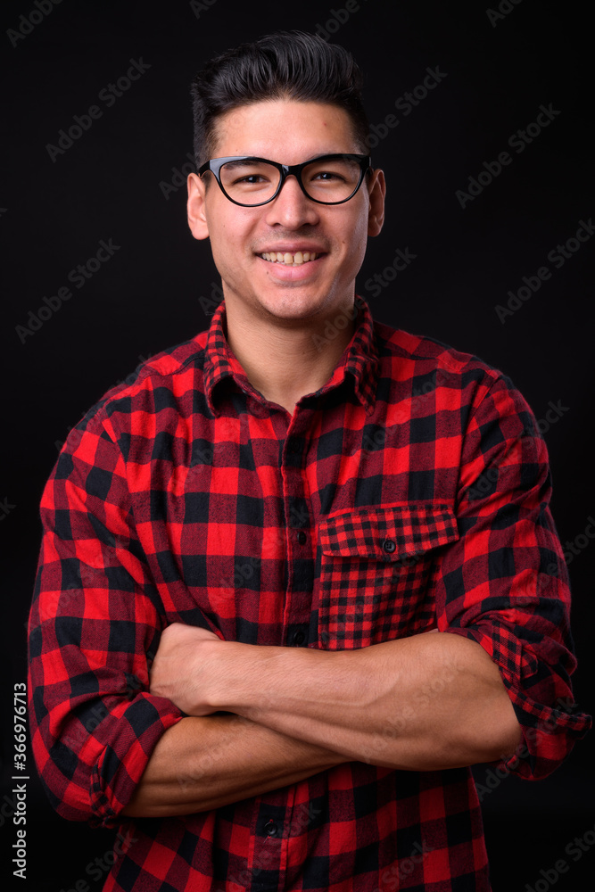 Obraz premium Portrait of young handsome hipster man with eyeglasses