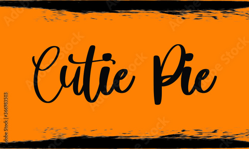 Cutie Pie Handwritten Typography Text on
Dark Yellow Background