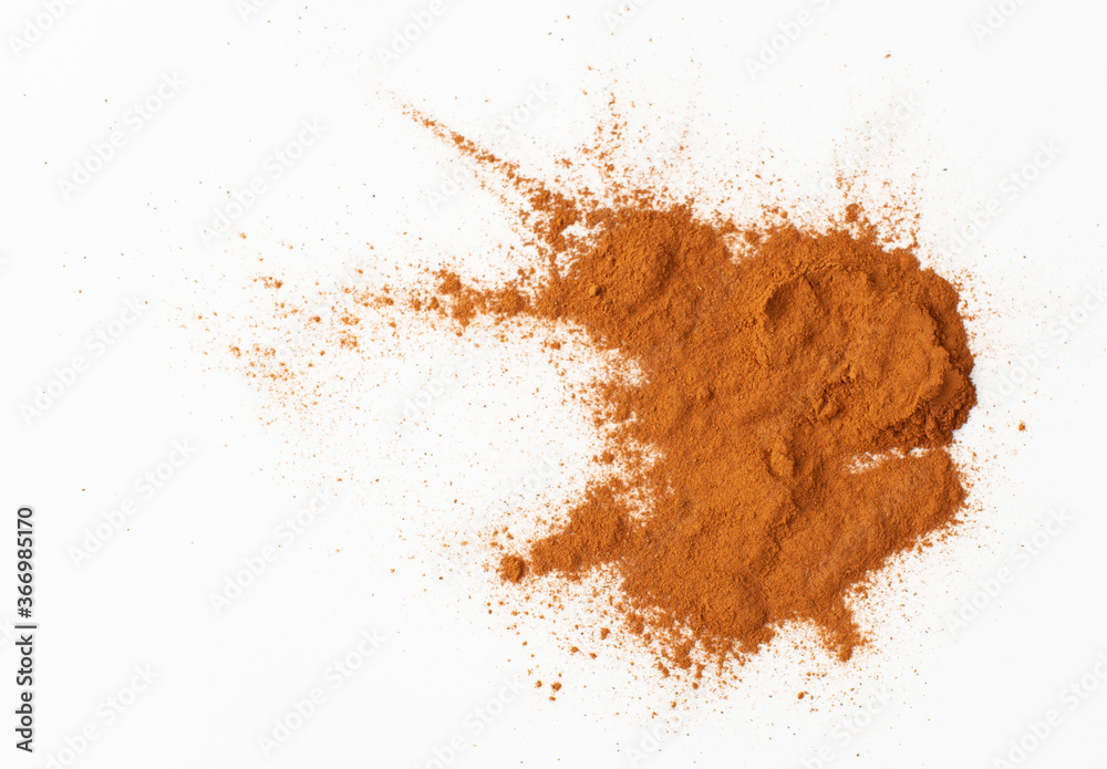 Background image of a pile of ground cinnamon Background image of a pile of ground cinnamon