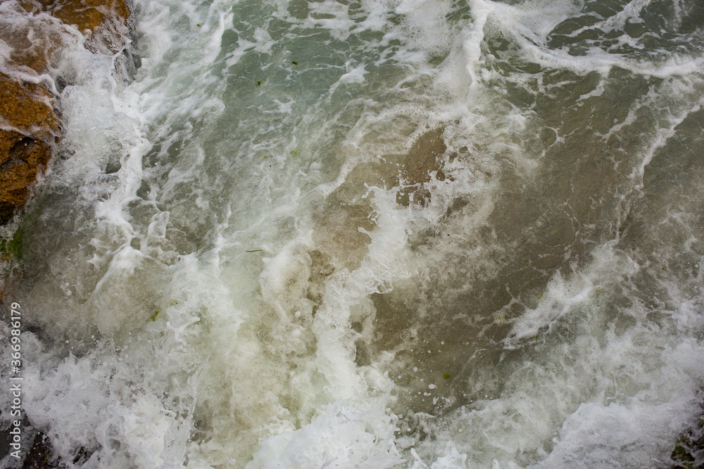 Waves during a storm. View from above. Red code. Rest on the Black Sea coast in Bulgaria. Elemental force. Waves during a storm. View from above. Red code. Rest on the Black Sea coast in Bulgaria. Elemental force.