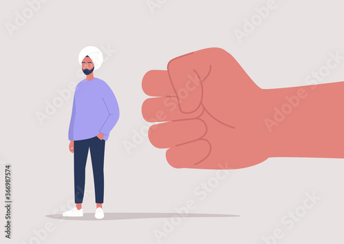 Modern society problems, a giant clenched fist attacking a young indian male character, racism and discrimination photo