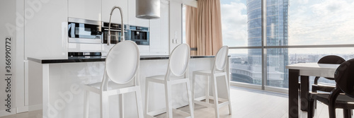 White kitchen with big windows  panorama