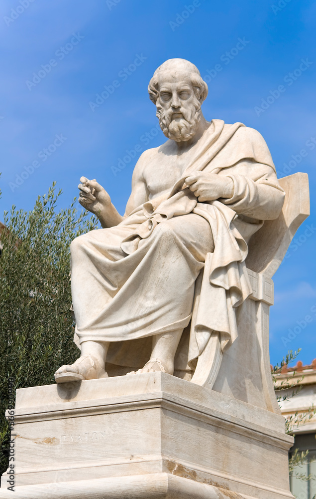 Plato statue against blue sky