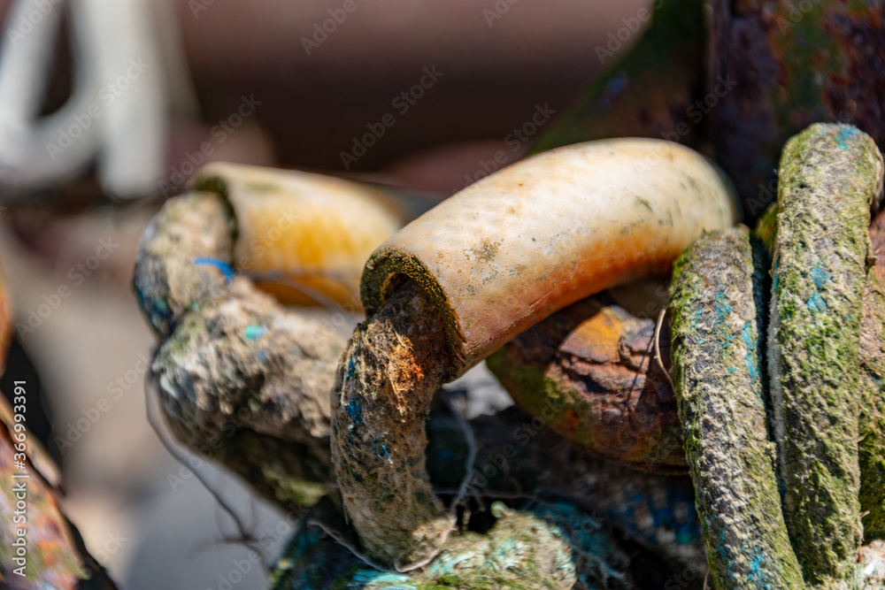 Close up of old ropes on a summer day in a harbor Close up of old ropes on a summer day in a harbor