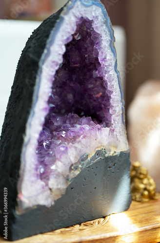 Vertical shot of amethyst geode on a table