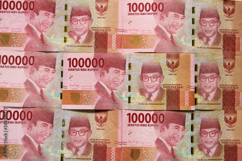 Indonesian rupiah for background. Indonesian rupiah banknotes series with the value of one hundred thousand rupiah IDR 100.000.
