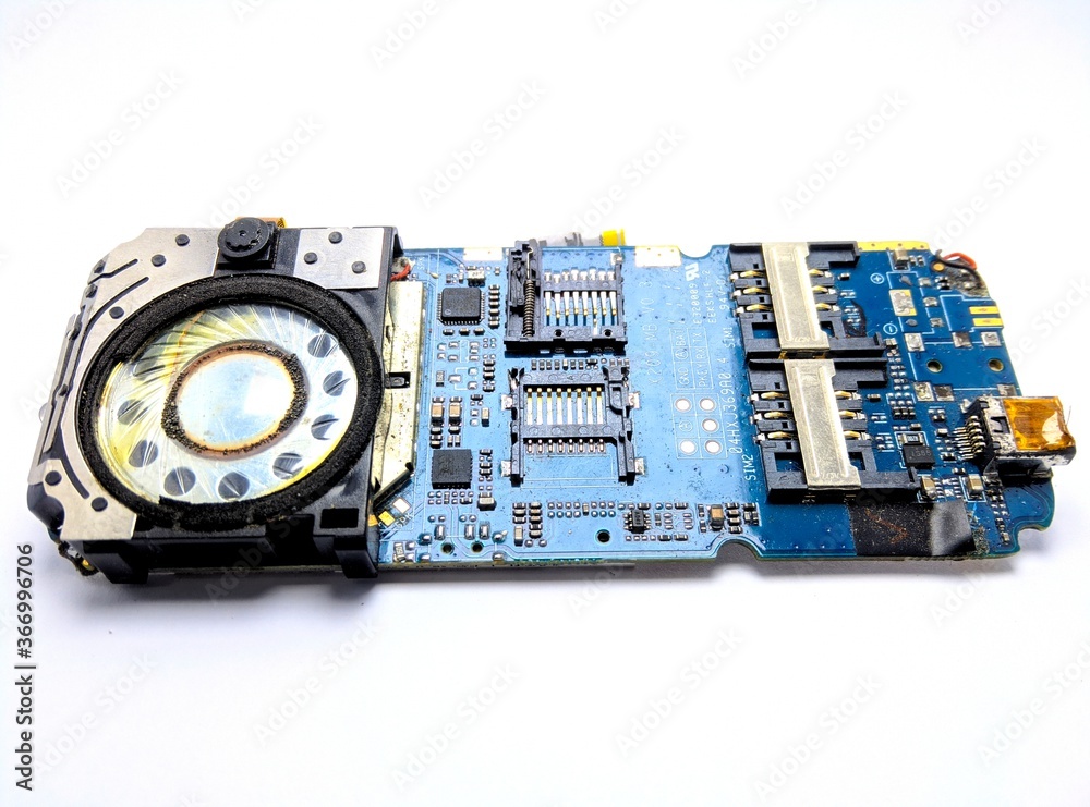 The old mobile machine was isolated from a white background The old mobile machine was isolated from a white background