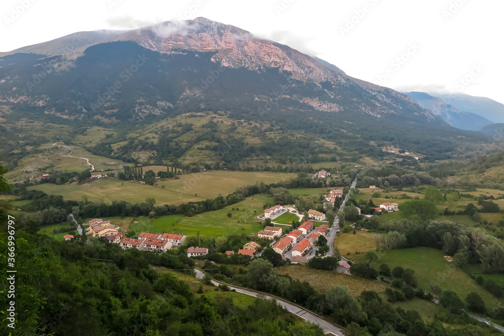 Fototapeta premium Small town among mountain valley, Opi commune, Abruzzo region, Aquila province, Italy