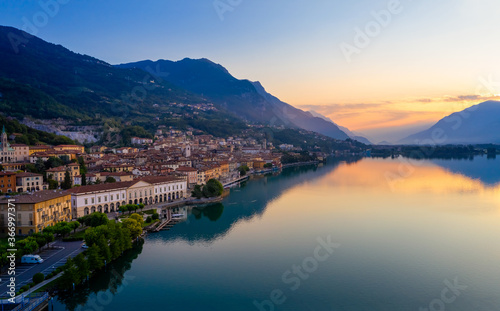 Aerial view of Lake Iseo at sunrise, on the left the city of lovere which runs along the lake,Bergamo Italy. © robertobinetti70
