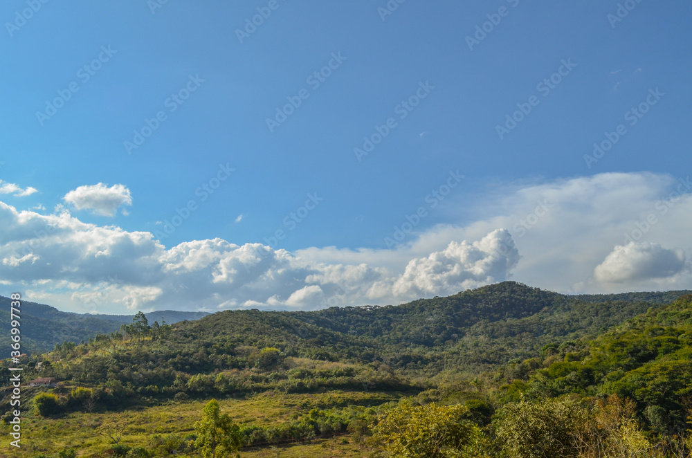 View of the mountains across the horizon near a small town in Brazil.