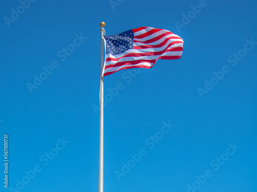 Photography Old Glory Waving in a Clear Blue Sky