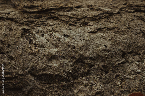 Concrete destroyed wall. Surface with large cracks. The texture of the cement. Concrete background.