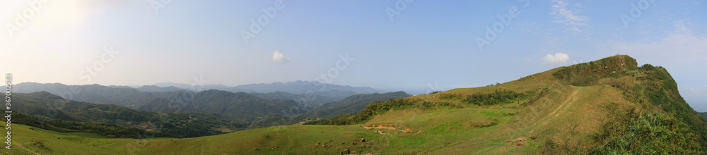 Sunny view of the beautiful grassland of Taoyuan Valley Sunny view of the beautiful grassland of Taoyuan Valley