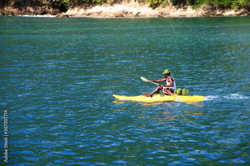 young man kayaking