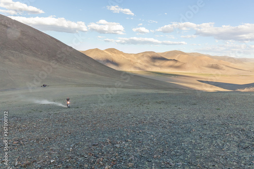 A motorcyclist tries his motorcycle in the mountains of Mongolia.