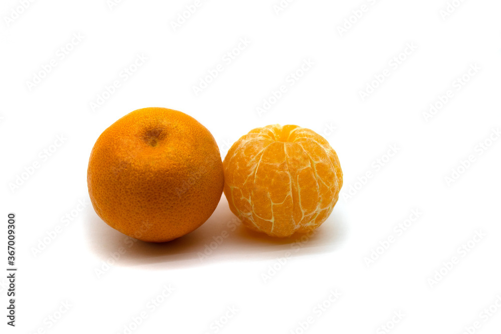 Tangerine whole and peeled Tangerine whole and peeled