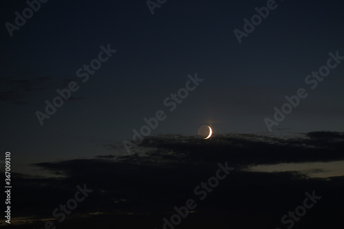 Foto The moon is a companion of our planet