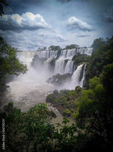 Amazing Iguazu falls in the brazilian side  framed by trees