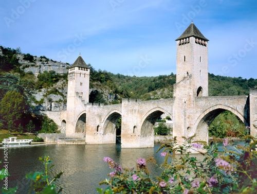 Pont Valentre arch bridge with towers over River Lot