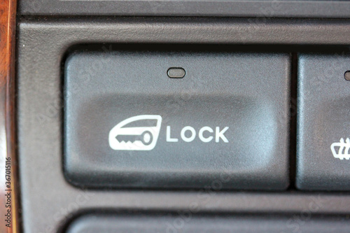 Close up of a power door lock button