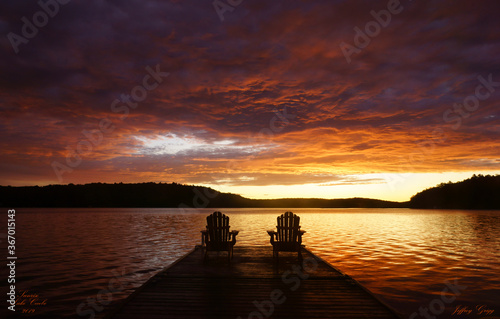 Adirondack chairs at sunrise