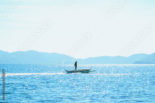 fisherman in the ocean
