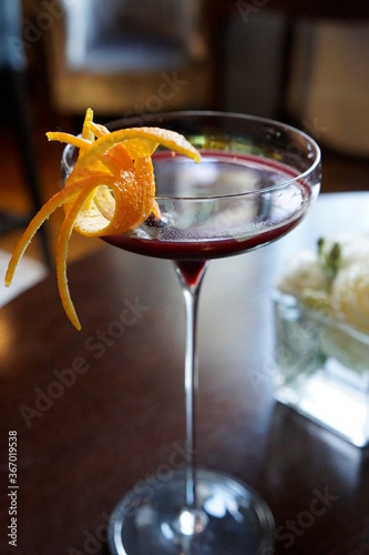 A gin based cocktail on the table photo