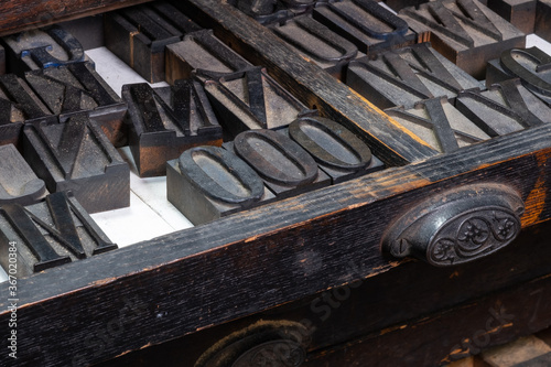 Antique wooden type in a drawer in a print shop © David Gales