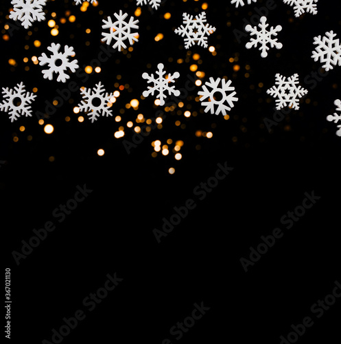 New Year's black color background snowflakes and glitters