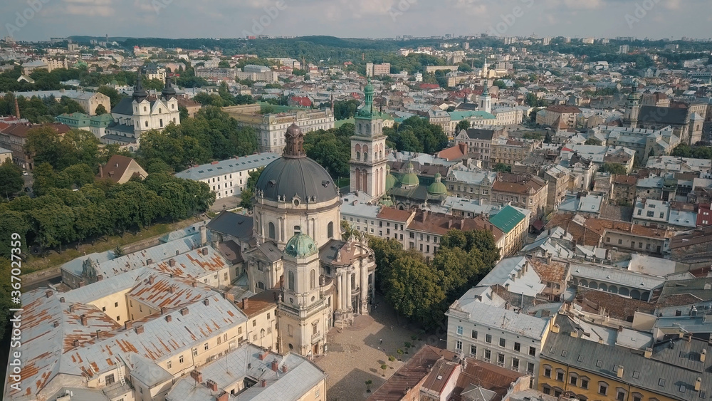 Aerial drone shot of city Lviv, Ukraine. Ancient Ukraine Dominican Church. Panorama of old town