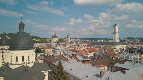 Aerial drone shot of european city Lviv, Ukraine. Rynok Square, Central Town Hall, Dominican Church © Andrii Iemelianenko