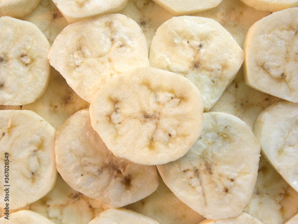 Yellow color raw sliced cut cooking plantain banana without skin Yellow color raw sliced cut cooking plantain banana without skin
