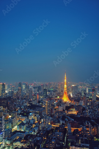 Tokyo Tower Night View - Business city concept image  modern cityscape building in evening  shot in Roppongi Hills of Minato Ward  Tokyo  Japan.