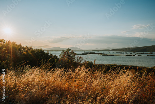 Beautiful sunset with view on lake scenic golden vacation