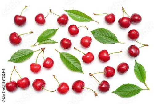 Cherries with leaves isolated on white background. Top view, flat lay