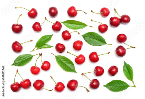 Cherries with leaves isolated on white background. Top view, flat lay