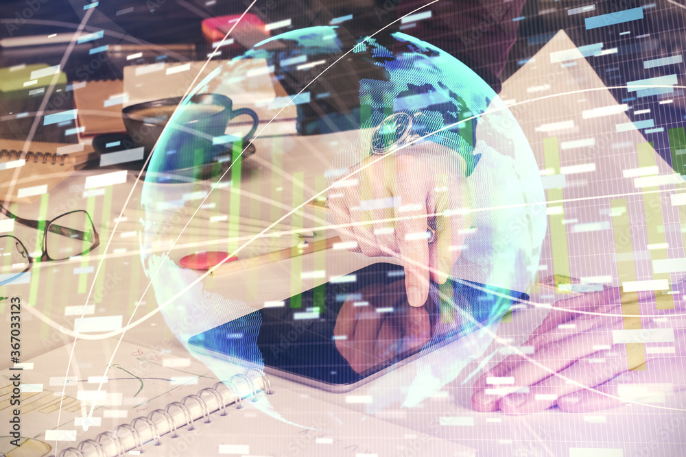 Double exposure of man's hands holding and using a phone and international business theme drawing. Double exposure of man's hands holding and using a phone and international business theme drawing.