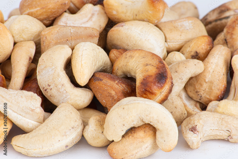 Roasted cashew nut. Texture and background. Close up view. Roasted cashew nut. Texture and background. Close up view.