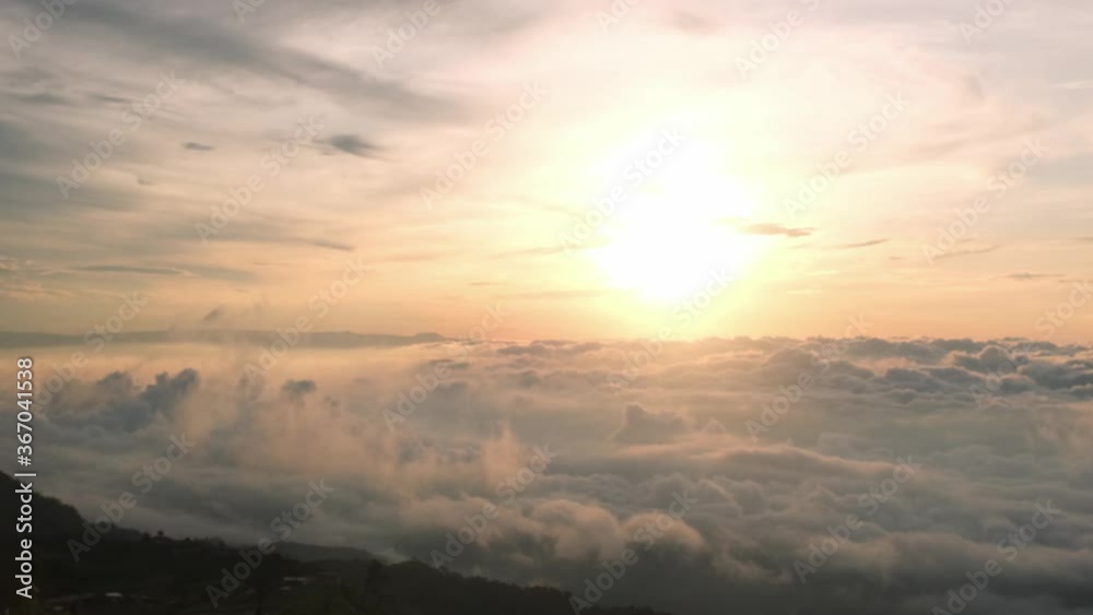 4k Above cloud shot in the morning with warm sunlight and cloud movement 4k Above cloud shot in the morning with warm sunlight and cloud movement