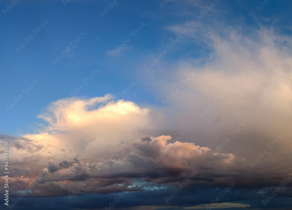 mystical multicolored clouds at dawn