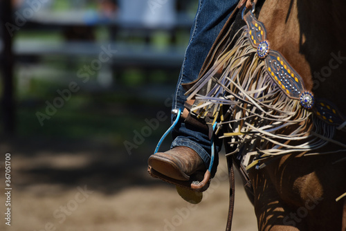 Close-up of Booted Foot in a Stirrup