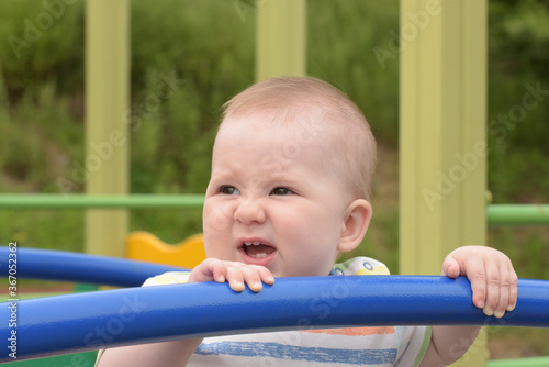 Baby on the playground © Visual Content