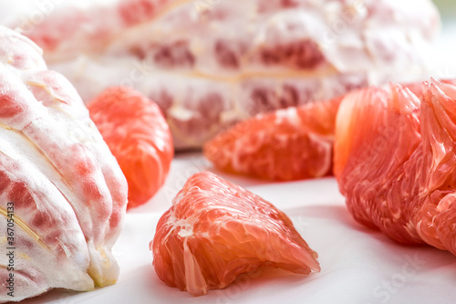 Close-up of red-meat honey pomelo still life